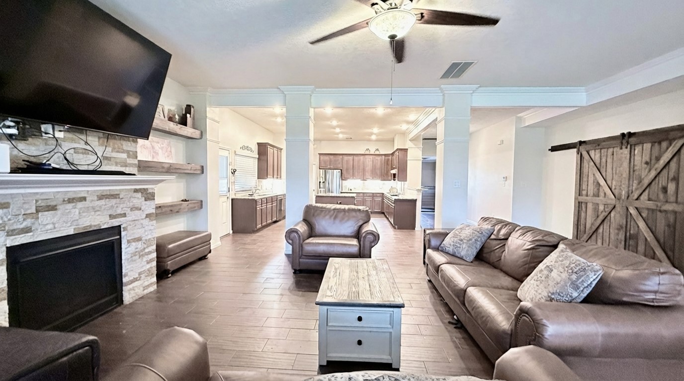 2504 Rosa Rita Drive League City, TX 77573 - Photo 17 of 41 a living room with furniture fireplace and flat screen tv
