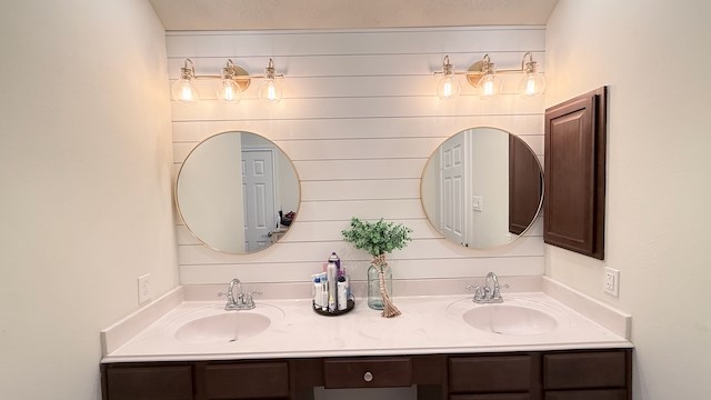 2504 Rosa Rita Drive League City, TX 77573 - Photo 27 of 44 RECENTLY UPGRADED THE MASTER BATH VANITY AREA WITH SHIPLAP WALLS, GOLD FIXTURES AND GOLD FRAMED ROUND MIRRORS!