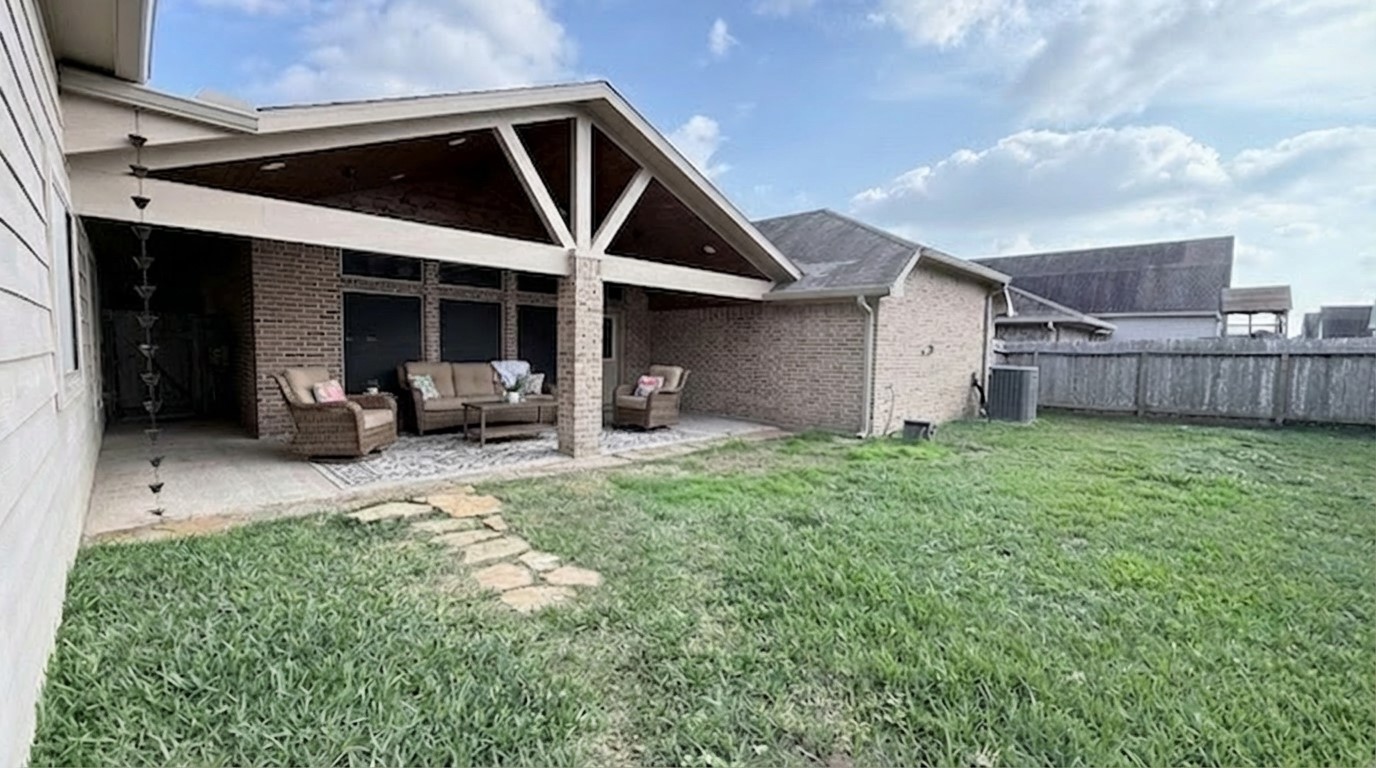2504 Rosa Rita Drive League City, TX 77573 - Photo 32 of 44 a view of a house with backyard and porch