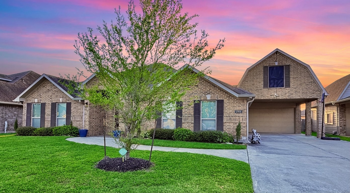 2504 Rosa Rita Drive League City, TX 77573 - Photo 42 of 44 a front view of a house with a yard and garage