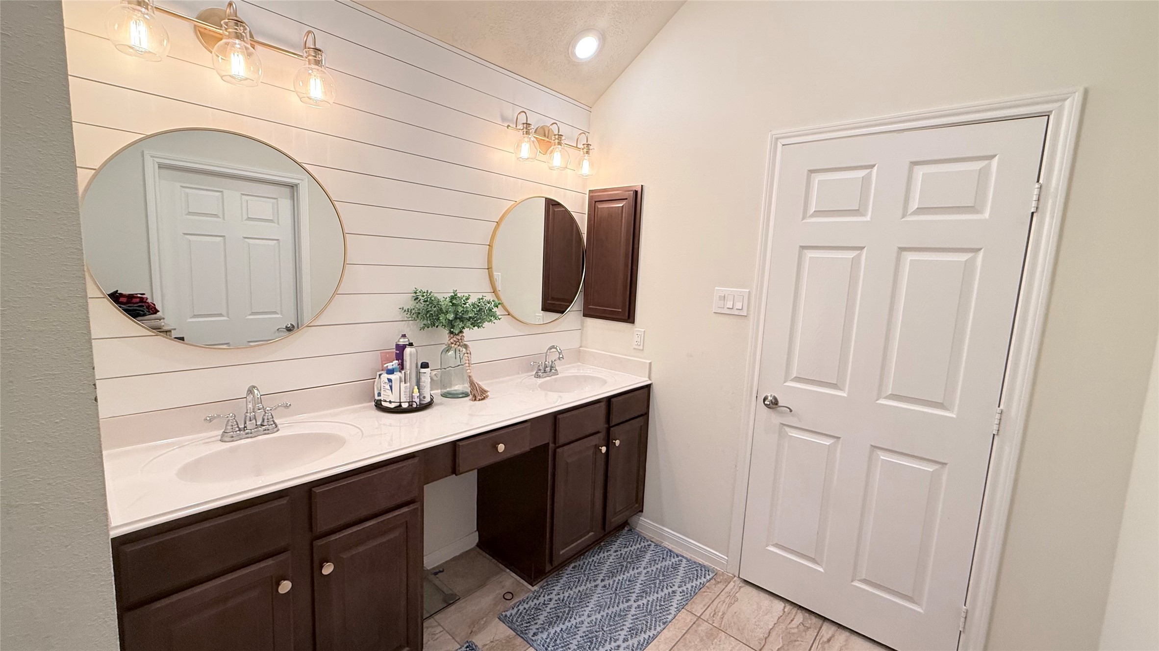 2504 Rosa Rita Drive League City, TX 77573 - Photo 9 of 44 a bathroom with a double vanity sink and a mirror
