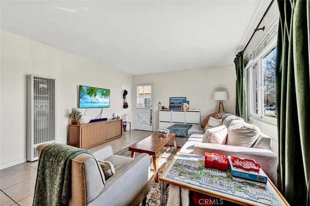 a kitchen with a stove a sink and a microwave