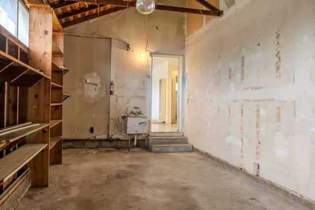 a view of a room with hardwood