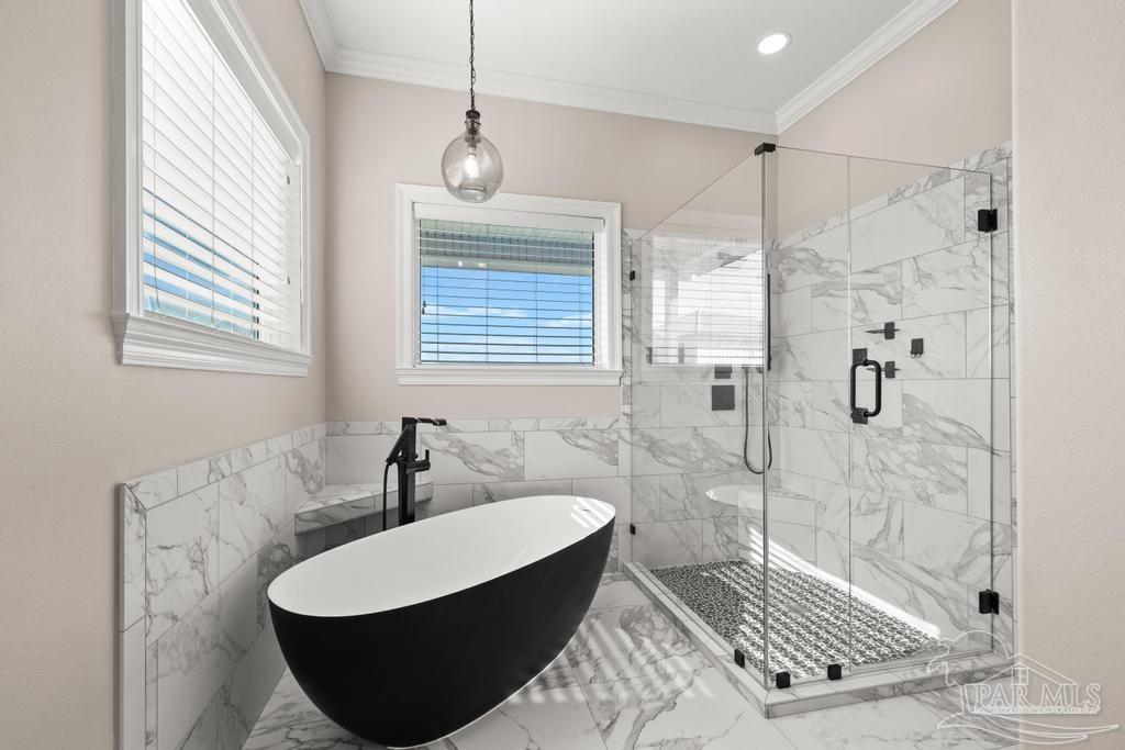 321 Gulfview Lane Perdido Key, FL 32507 - Photo 24 of 57 a bath room with a sink a mirror a vanity and a shower
