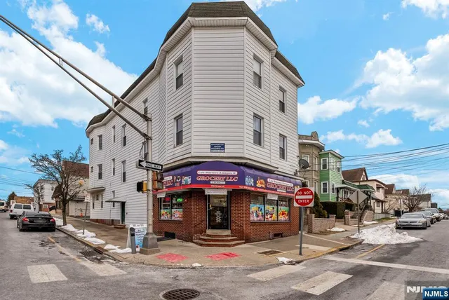 a front view of a building with street