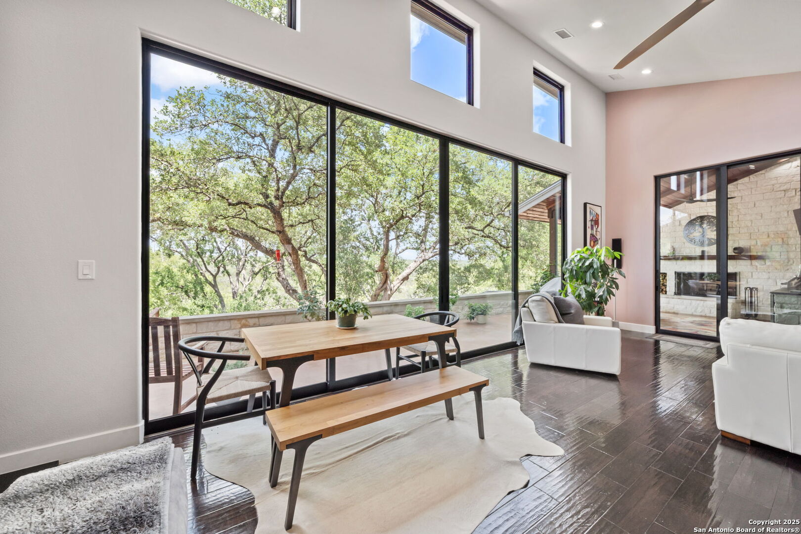 172 Bluff Street Dripping Springs, TX 78620 - Photo 13 of 39 a living room with furniture and a large window
