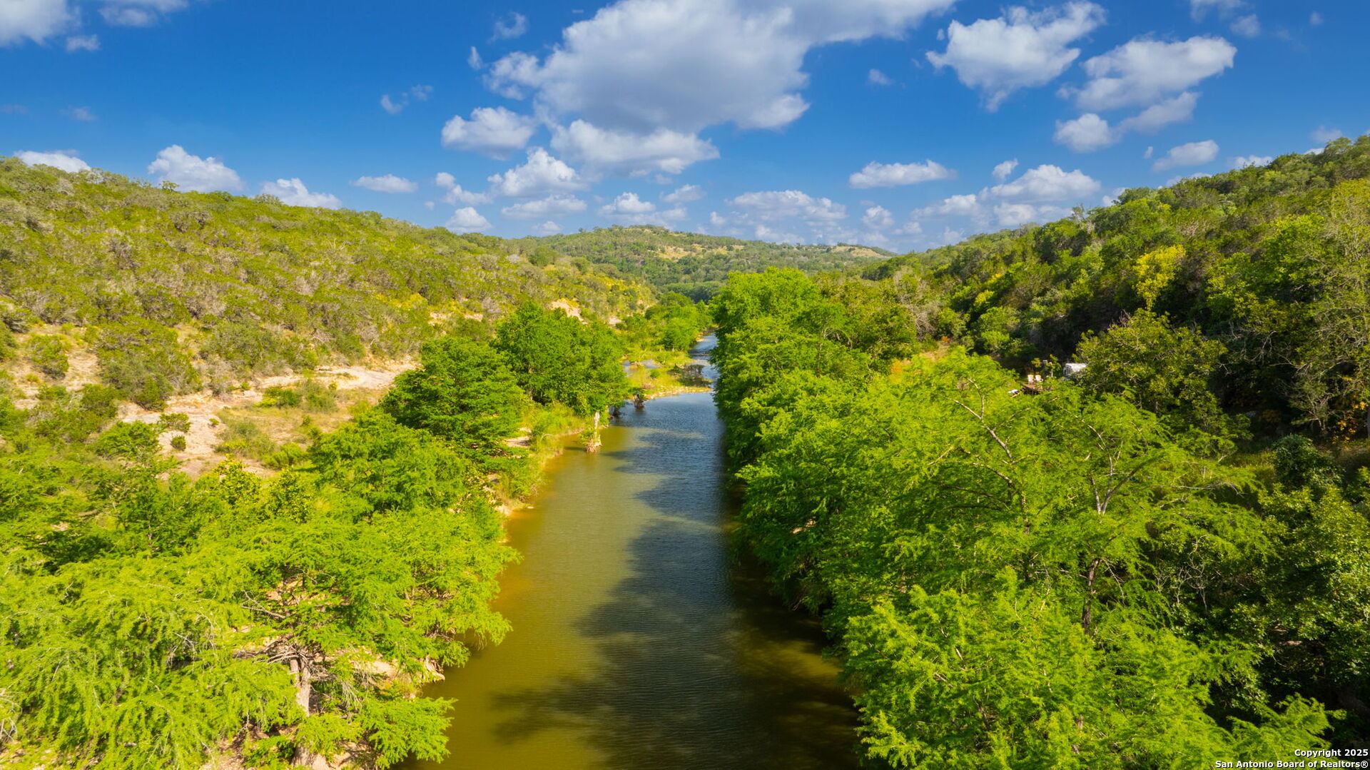 172 Bluff Street Dripping Springs, TX 78620 - Photo 26 of 39 a view of an outdoor space and a yard