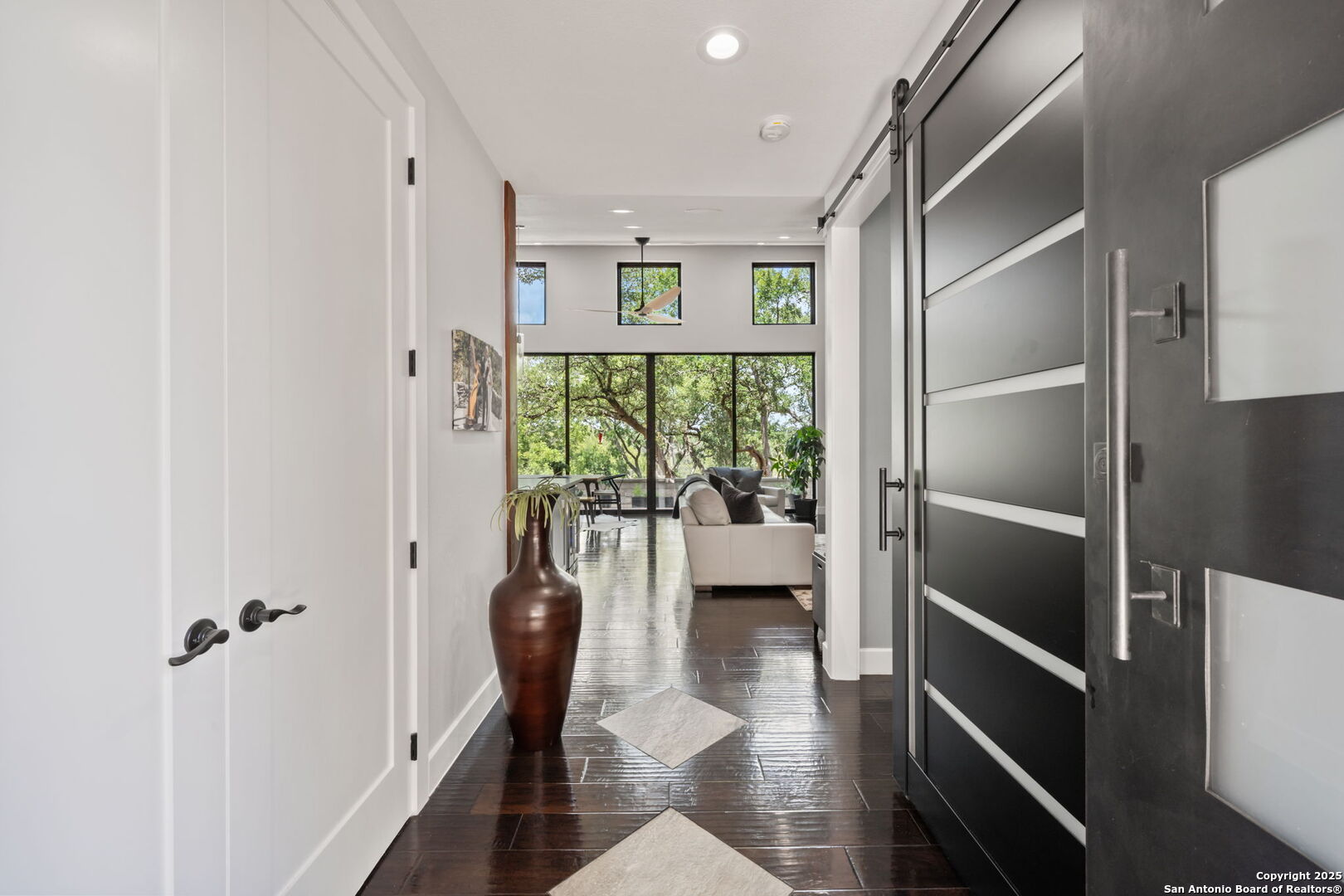 172 Bluff Street Dripping Springs, TX 78620 - Photo 5 of 39 a very nice looking room with a large window