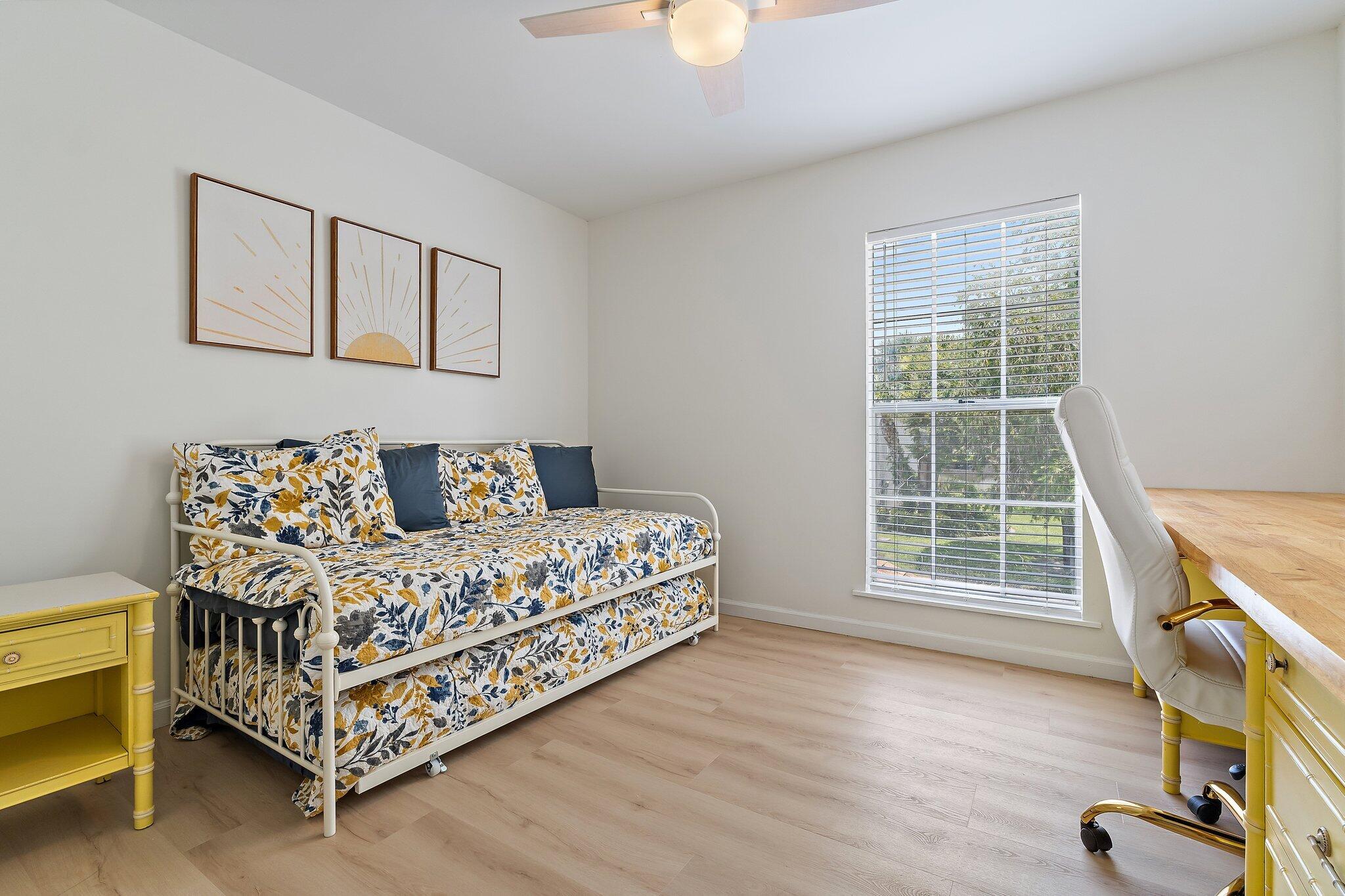 11830 Brier Patch Court Wellington, FL 33414 - Photo 21 of 34 a bed room with a bed and a chair