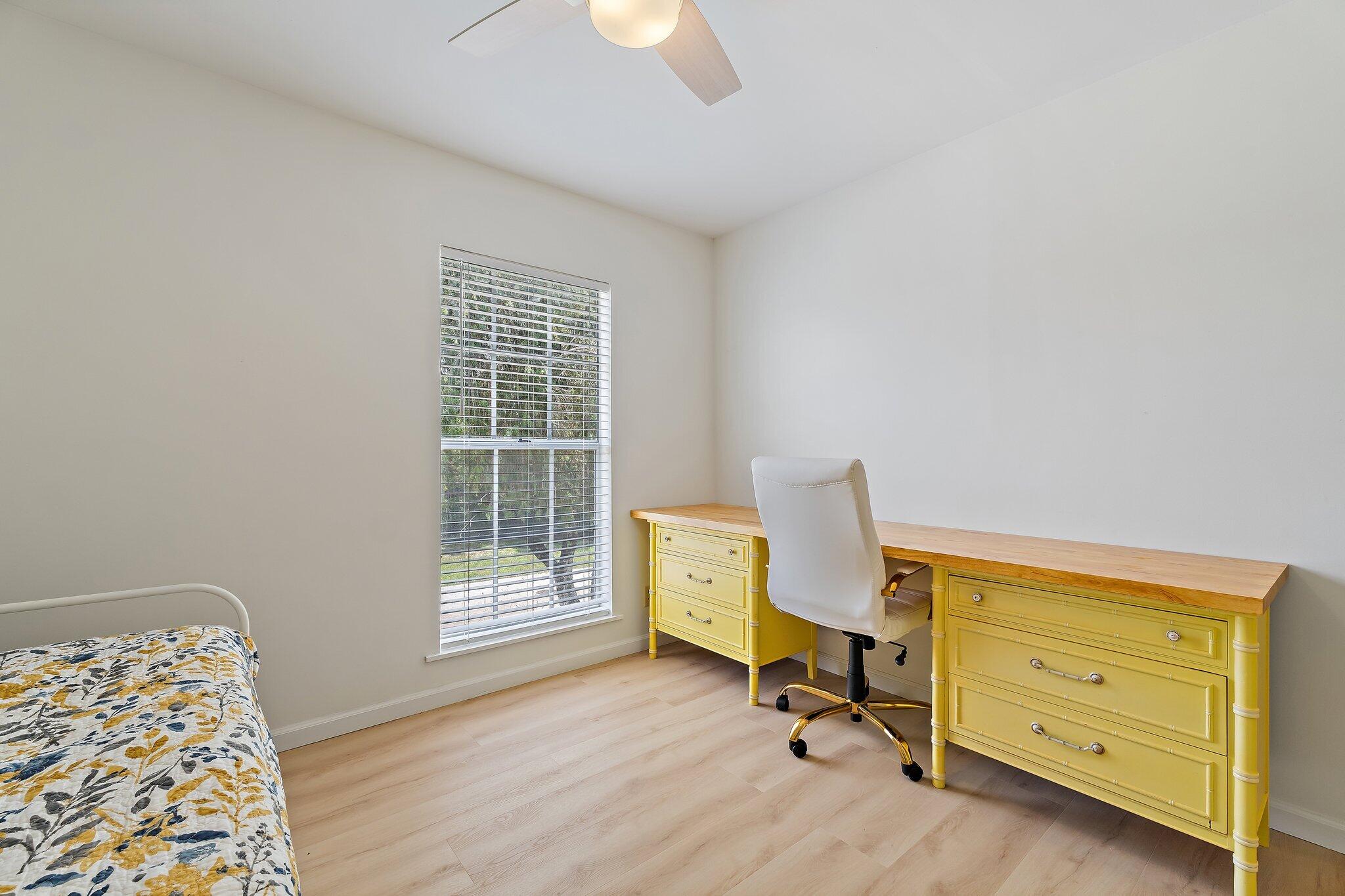 11830 Brier Patch Court Wellington, FL 33414 - Photo 22 of 34 a view of a workspace with furniture and a window