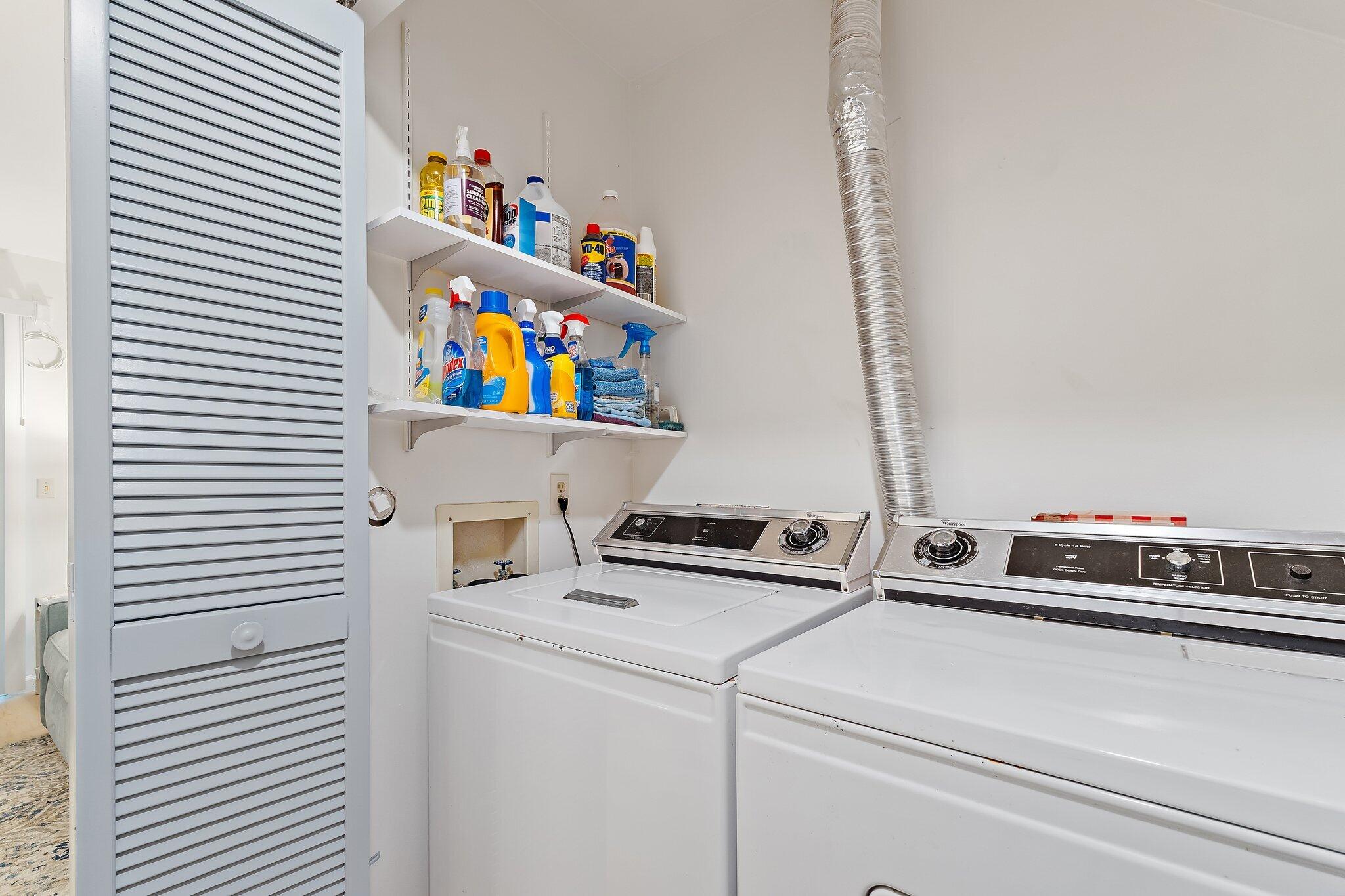 11830 Brier Patch Court Wellington, FL 33414 - Photo 26 of 34 a utility room with dryer and washer