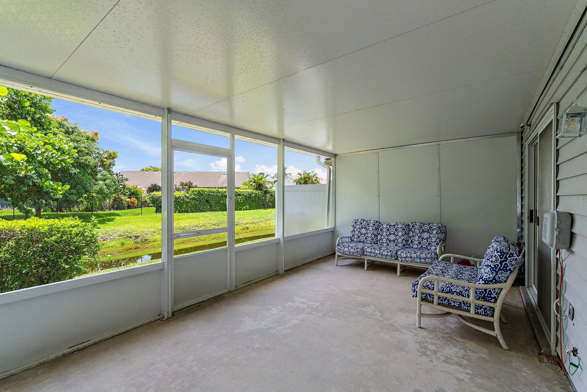 11830 Brier Patch Court Wellington, FL 33414 - Photo 27 of 34 a outdoor space with the outdoor seating