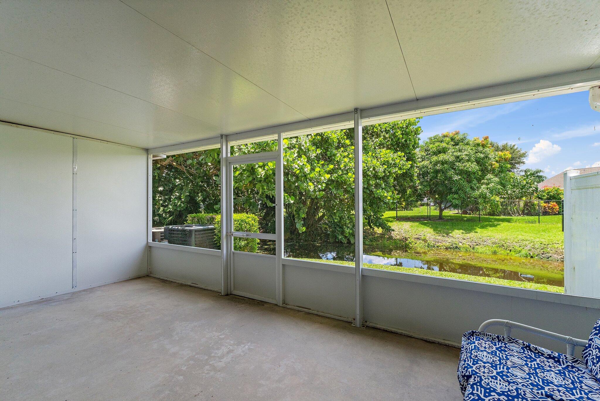 11830 Brier Patch Court Wellington, FL 33414 - Photo 28 of 34 a view of a room with a large window