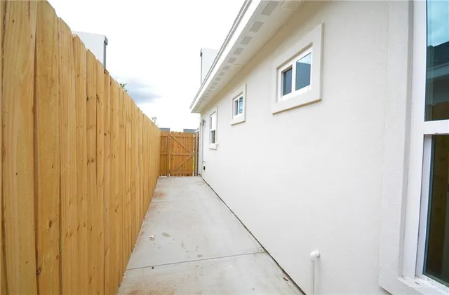 a view of a back yard of the house