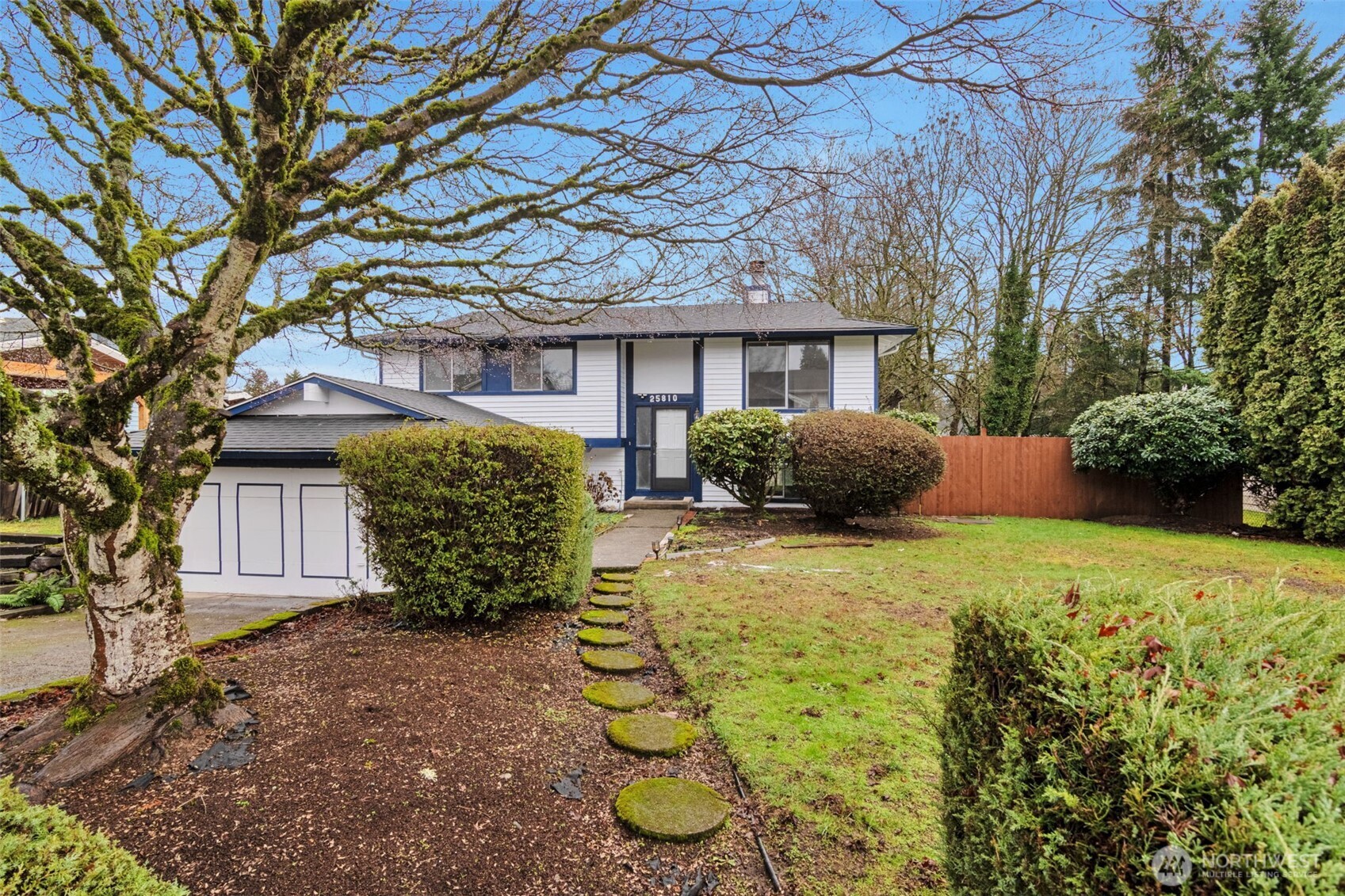 25810 129th Place Southeast Kent, WA 98030 - Photo 1 of 25 a front view of a house with garden
