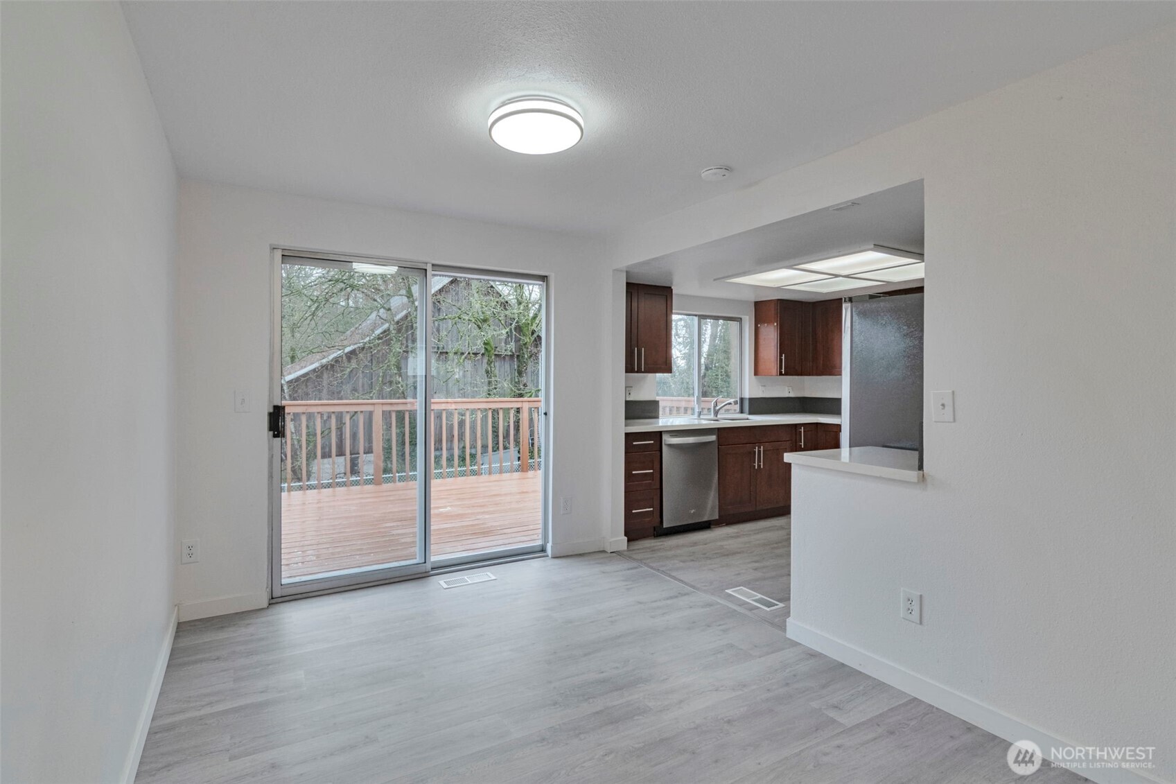 25810 129th Place Southeast Kent, WA 98030 - Photo 13 of 25 a view of a kitchen with a sink and dishwasher