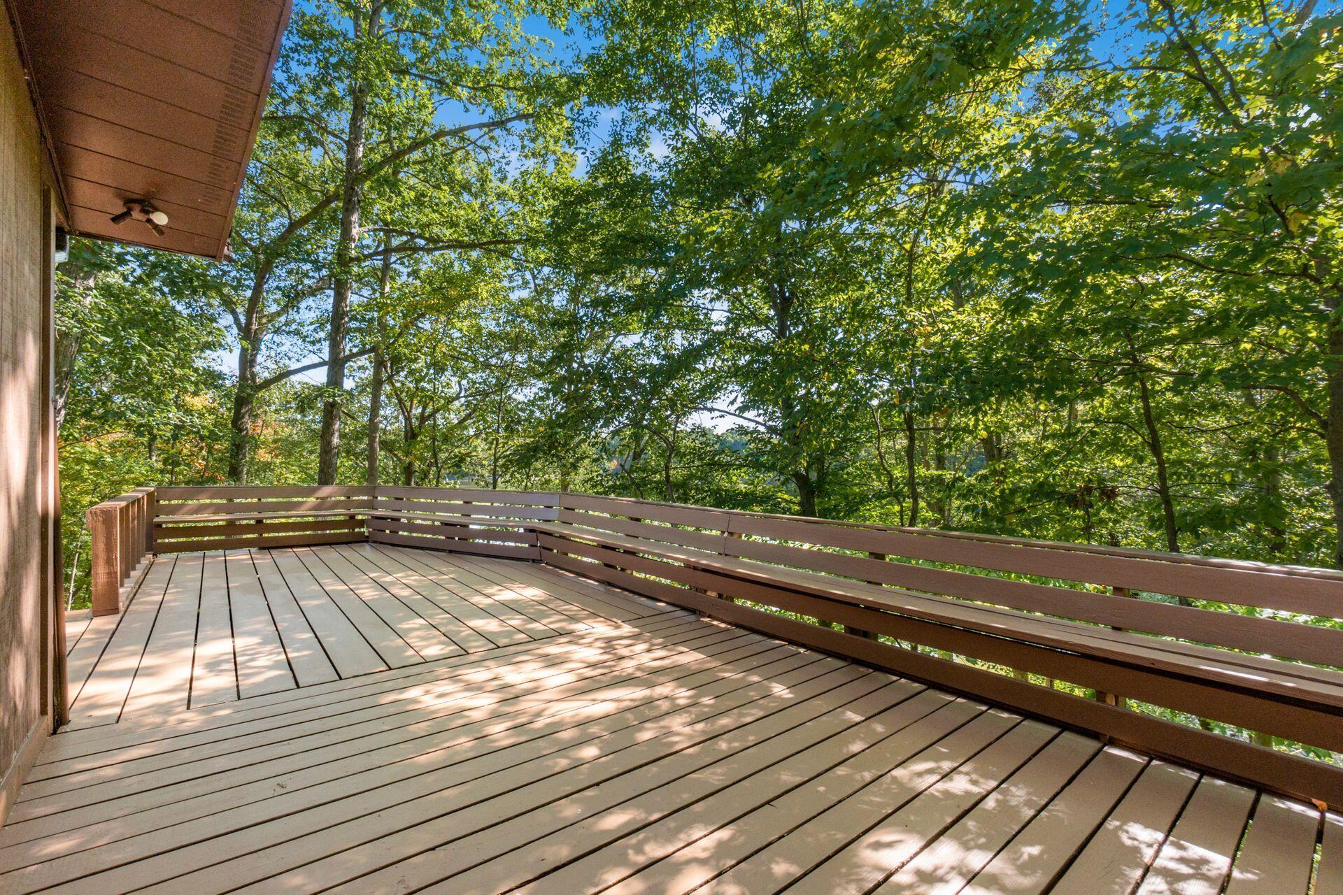4610 Red Bank Road Galena, OH 43021 - Photo 58 of 88 Back Deck extends the entirety of the home with built in seating overlooking water!