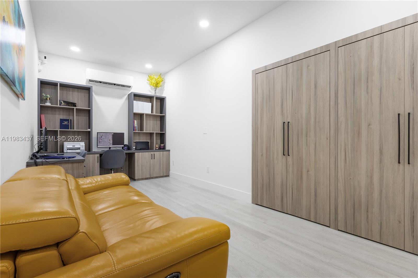4335 Southwest 174th Avenue Miramar, FL 33029 - Photo 17 of 58 a living room with furniture and a wooden floor