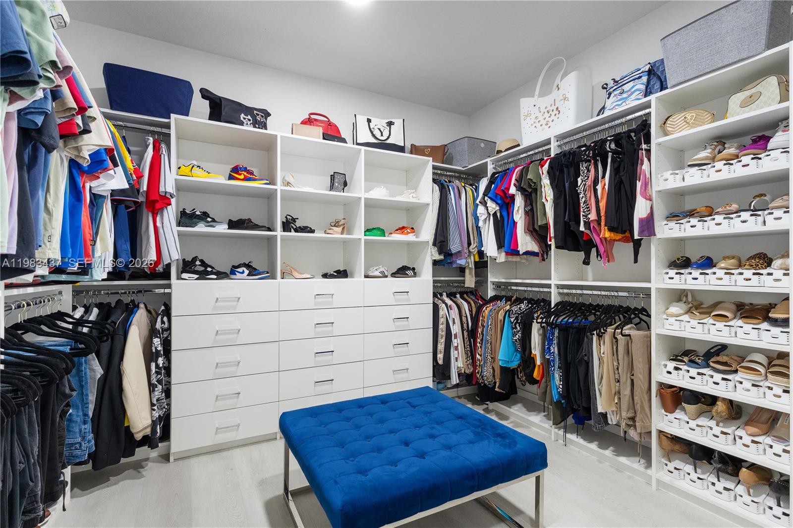 4335 Southwest 174th Avenue Miramar, FL 33029 - Photo 29 of 58 a view of walk in closet with clothes and shoes
