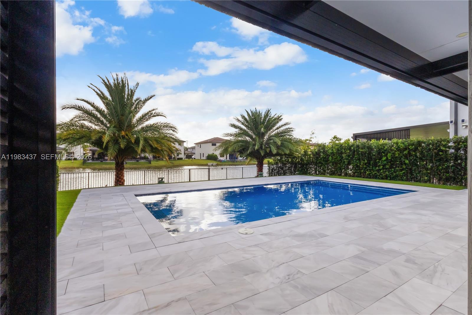 4335 Southwest 174th Avenue Miramar, FL 33029 - Photo 37 of 58 a view of swimming pool with sitting area