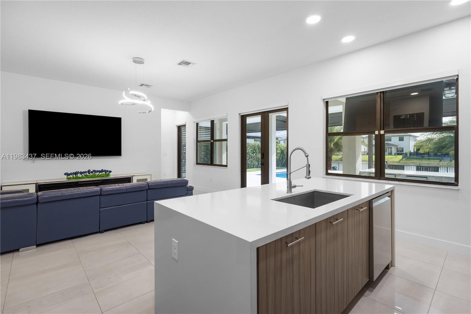 4335 Southwest 174th Avenue Miramar, FL 33029 - Photo 10 of 58 a kitchen with sink and microwave
