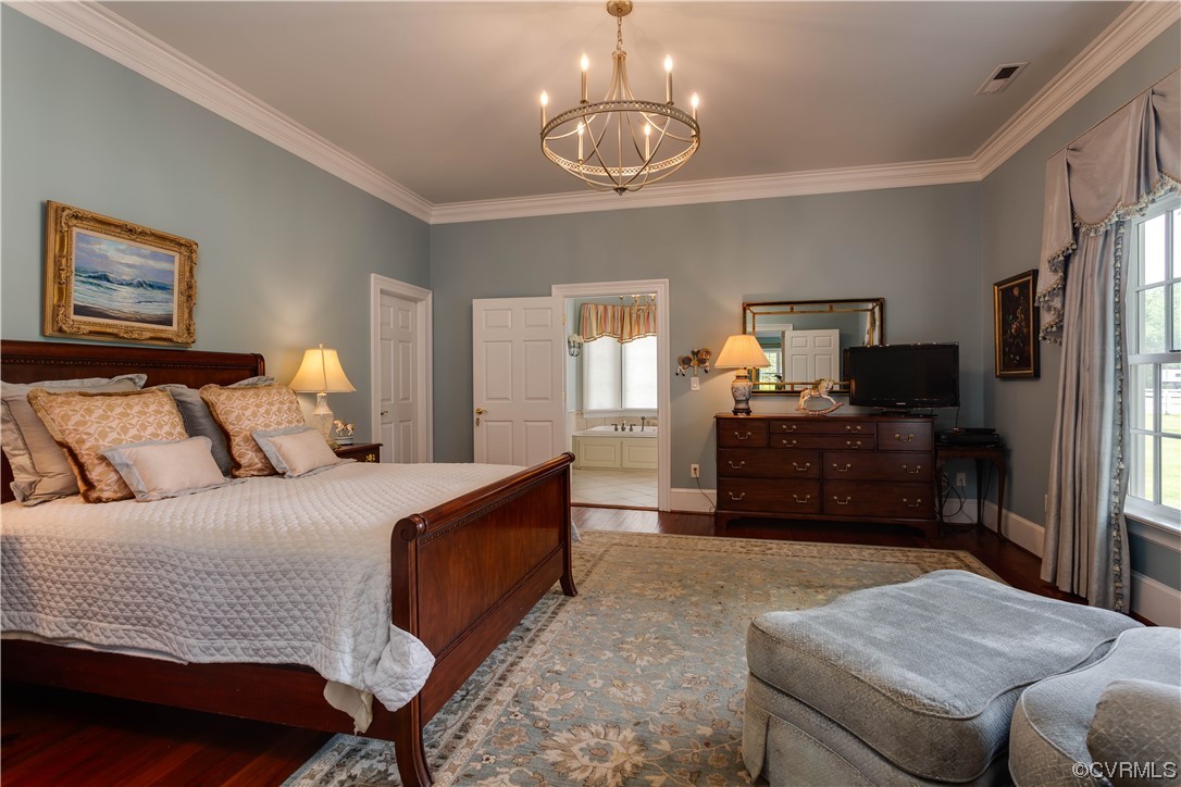 1248 Hobbs Mill Road Wilsons, VA 23894 - Photo 12 of 50 a bedroom with a bed and a television
