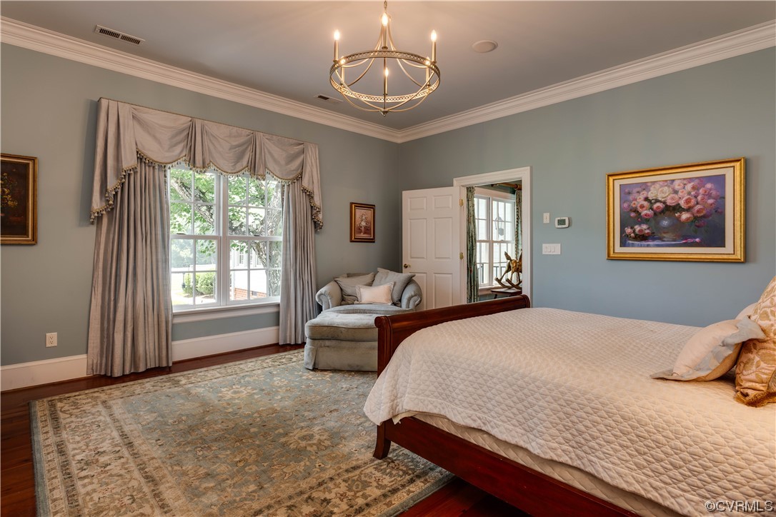 1248 Hobbs Mill Road Wilsons, VA 23894 - Photo 13 of 50 a bedroom with a bed couches chair and a large window