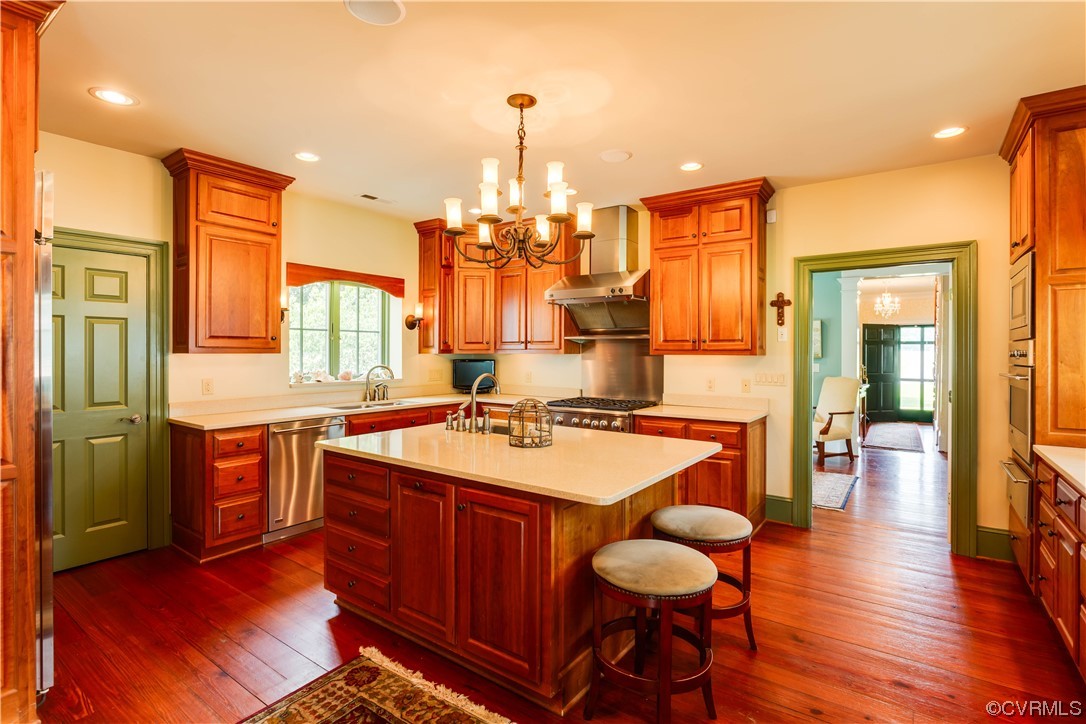 1248 Hobbs Mill Road Wilsons, VA 23894 - Photo 18 of 50 a large kitchen with a table and chairs