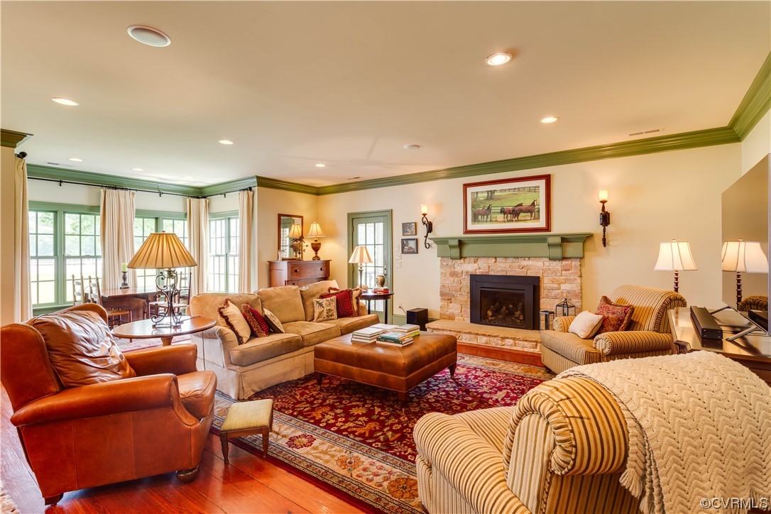 1248 Hobbs Mill Road Wilsons, VA 23894 - Photo 19 of 50 a large living room with a couch and a fireplace