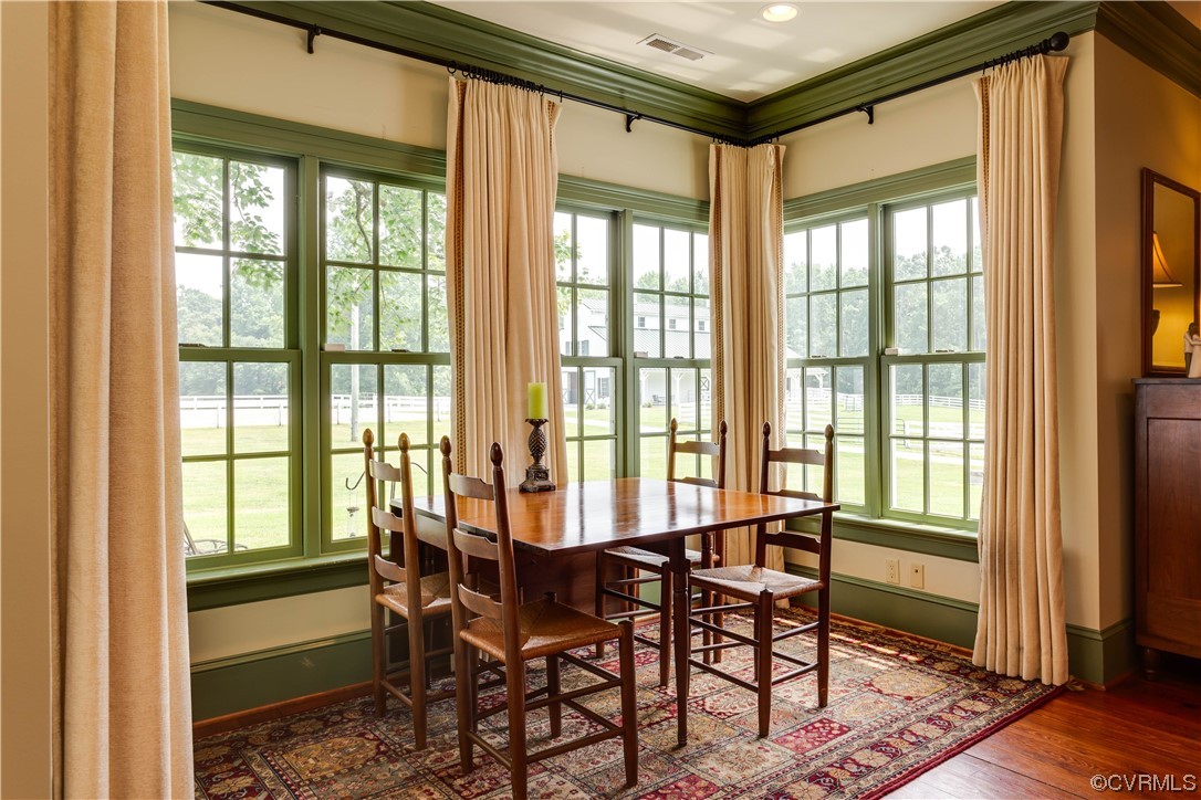1248 Hobbs Mill Road Wilsons, VA 23894 - Photo 20 of 50 a view of a dining room with furniture window and wooden floor