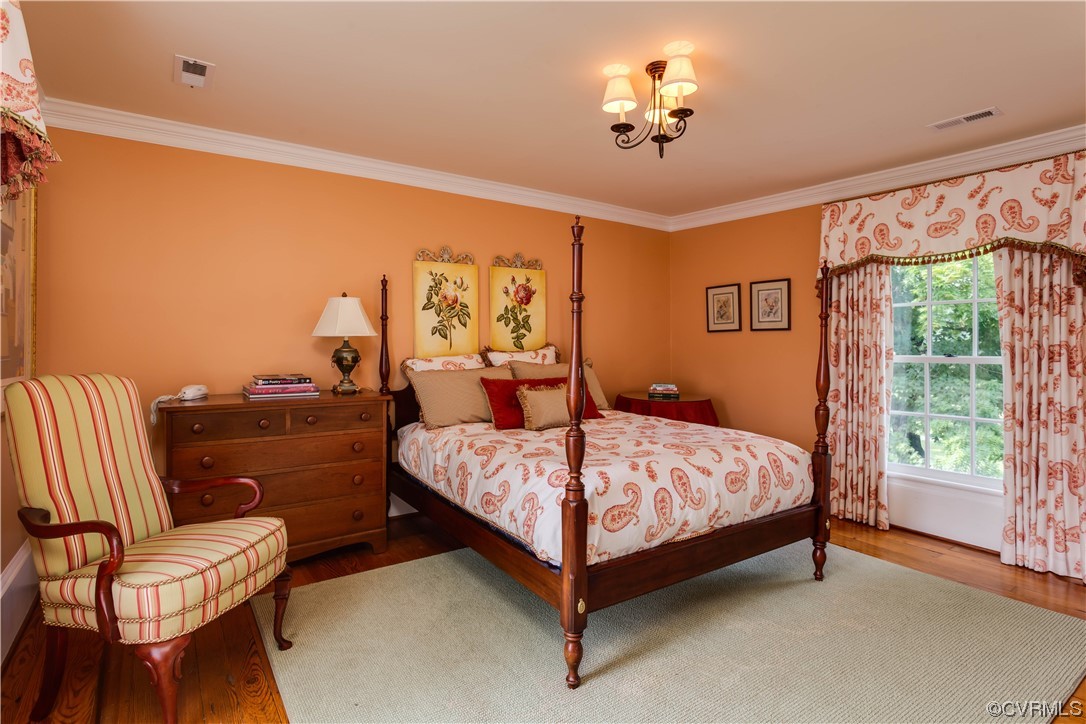 1248 Hobbs Mill Road Wilsons, VA 23894 - Photo 23 of 50 a bedroom with a bed and a couch
