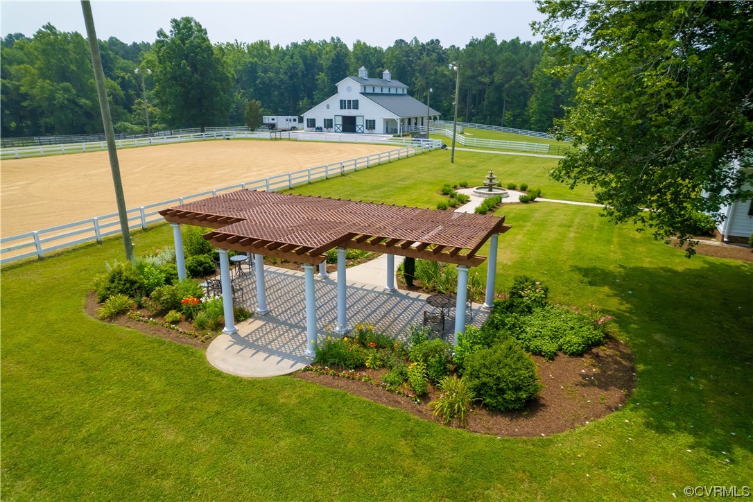 1248 Hobbs Mill Road Wilsons, VA 23894 - Photo 29 of 50 a view of a swimming pool with a garden