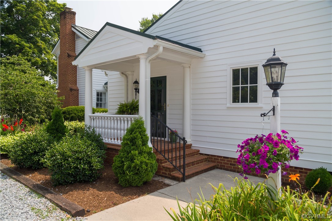 1248 Hobbs Mill Road Wilsons, VA 23894 - Photo 31 of 50 a front view of a house with a yard