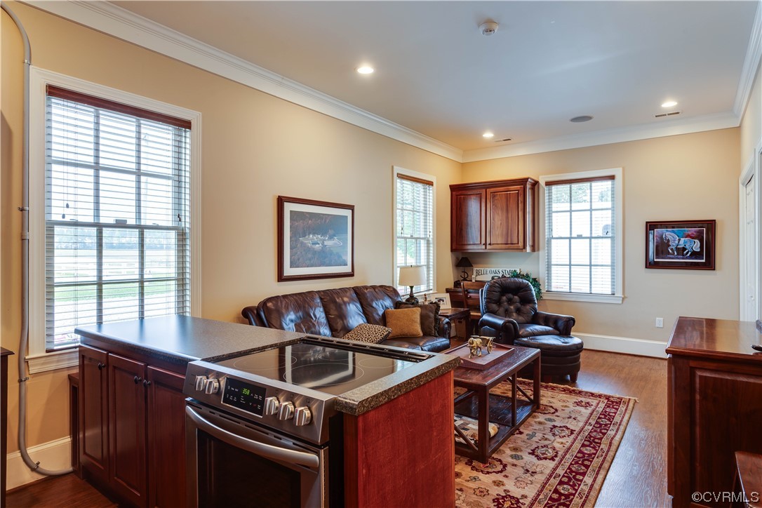 1248 Hobbs Mill Road Wilsons, VA 23894 - Photo 39 of 50 a kitchen with a stove a sink a counter top space and a window