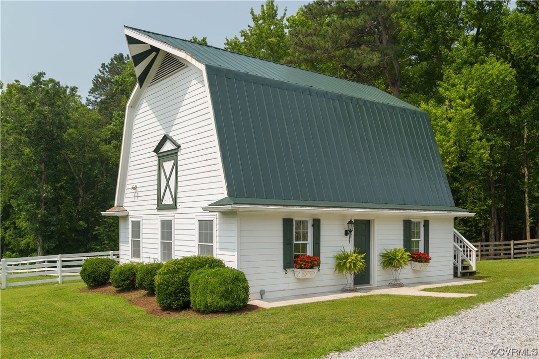 1248 Hobbs Mill Road Wilsons, VA 23894 - Photo 45 of 50 a front view of a house with a yard