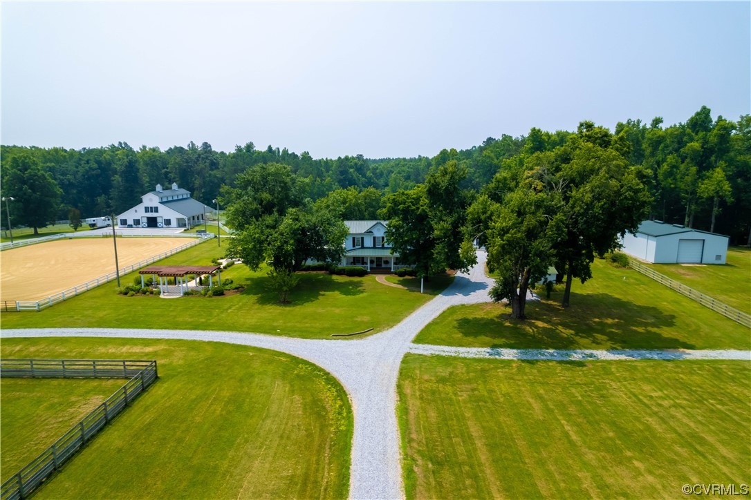 1248 Hobbs Mill Road Wilsons, VA 23894 - Photo 5 of 50 a view of a swimming pool with a yard and plants