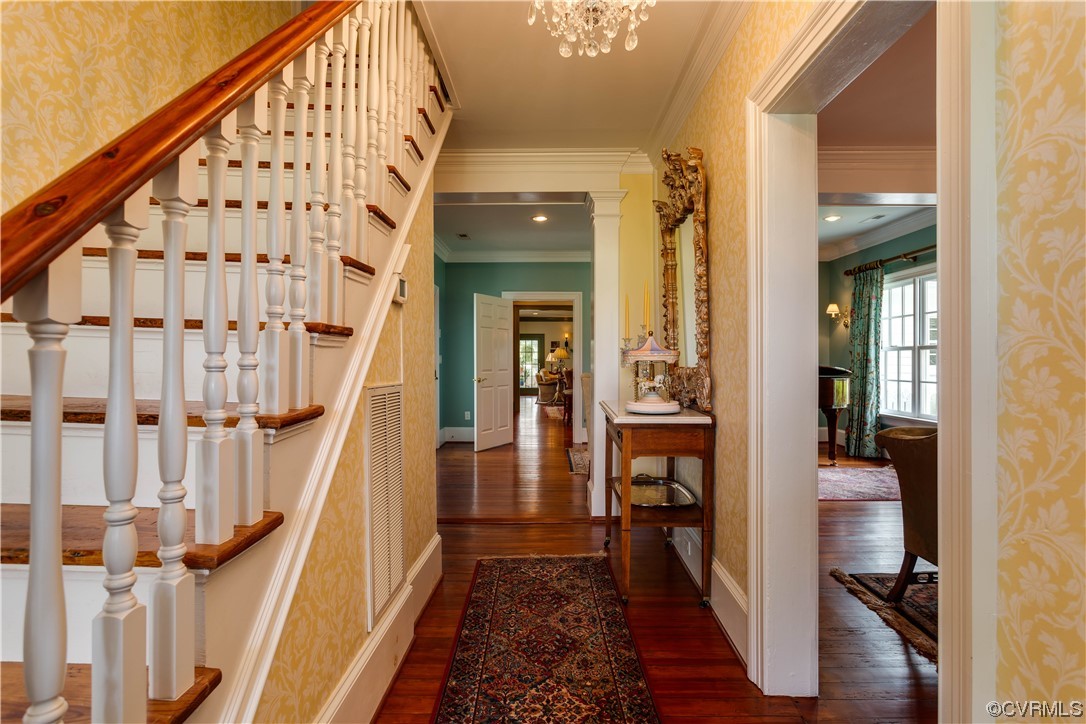 1248 Hobbs Mill Road Wilsons, VA 23894 - Photo 7 of 50 a view of a hallway with wooden floor and staircase