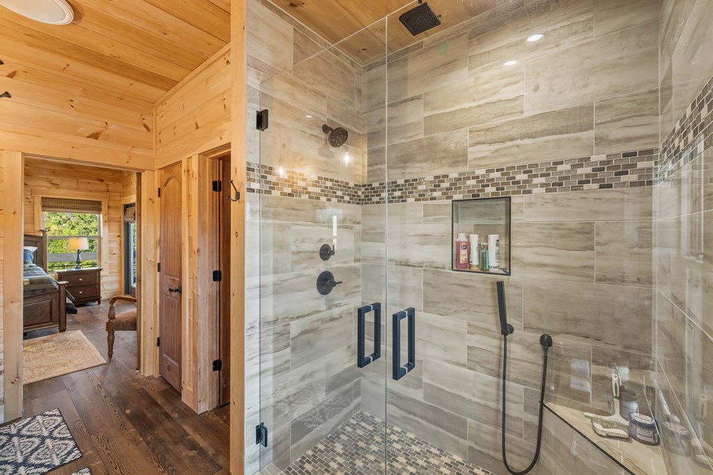 102 High Mdws Trail Morganton, GA 30560 - Photo 18 of 45 a bathroom with a shower