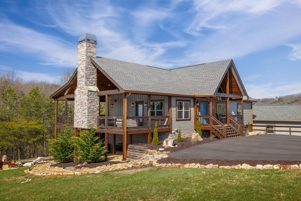 102 High Mdws Trail Morganton, GA 30560 - Photo 2 of 45 an front view of a house with garden