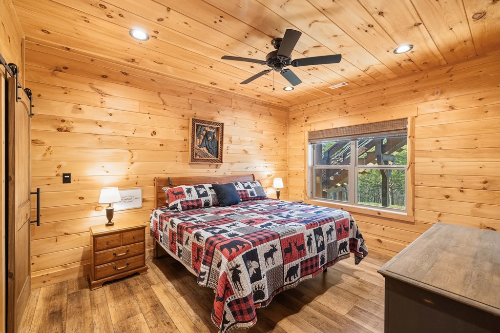 102 High Mdws Trail Morganton, GA 30560 - Photo 28 of 45 a bedroom with a bed and window