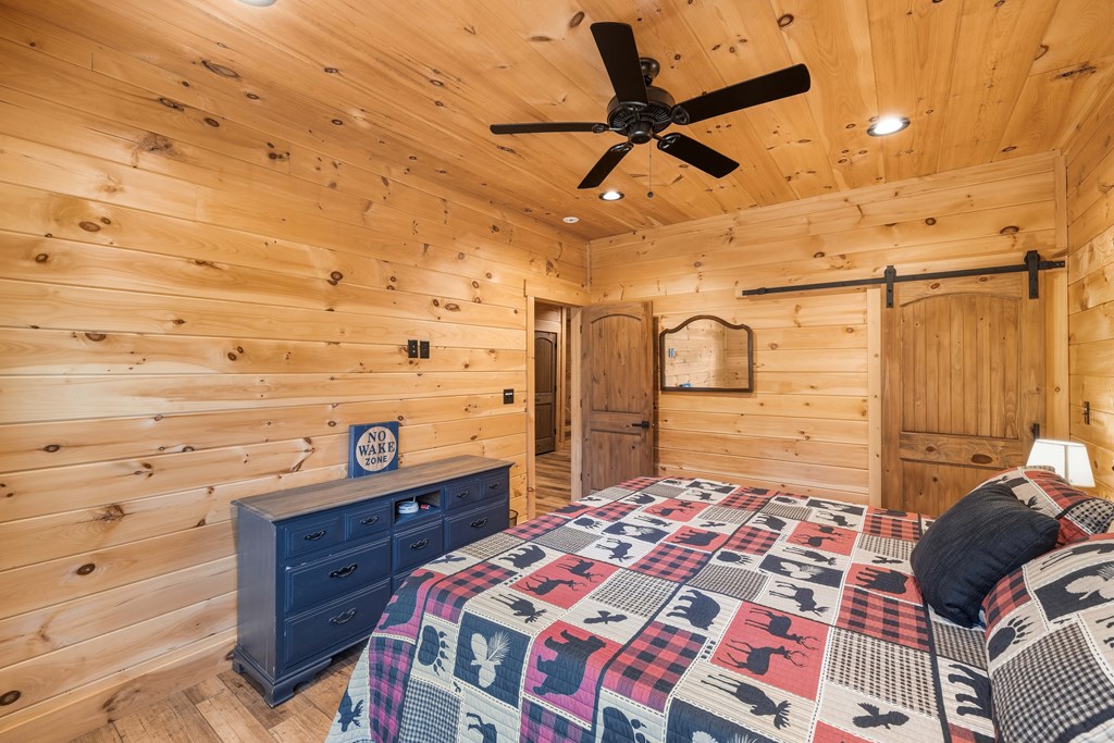 102 High Mdws Trail Morganton, GA 30560 - Photo 29 of 45 a bedroom with a bed and a dresser