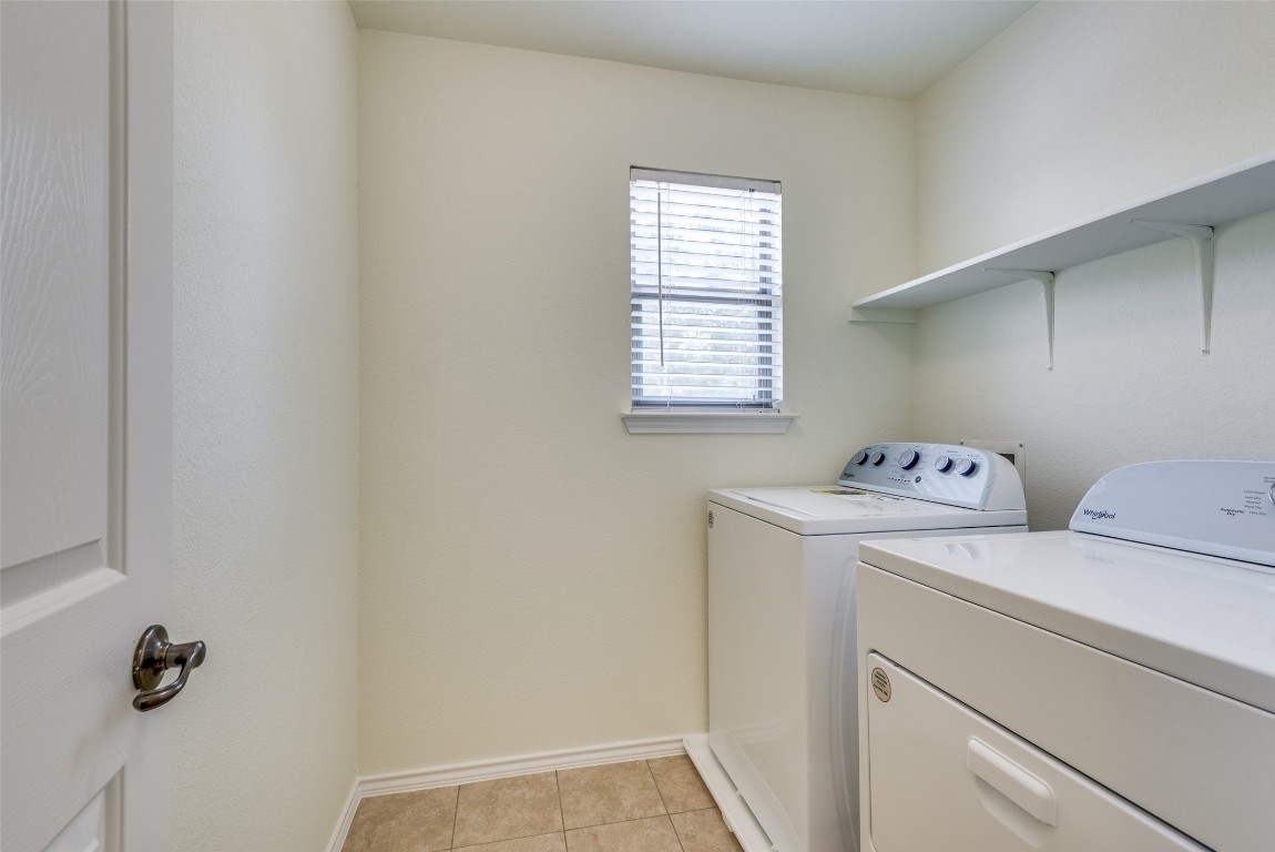 5701 Viewpoint Drive Austin, TX 78744 - Photo 18 of 25 a utility room with dryer and washer