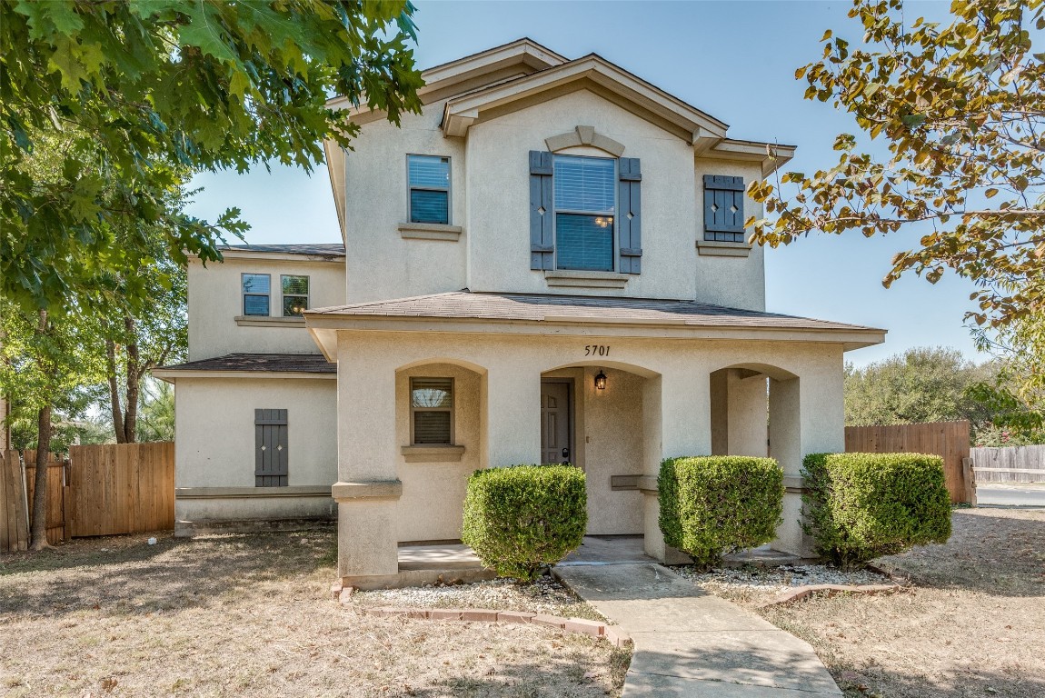 5701 Viewpoint Drive Austin, TX 78744 - Photo 2 of 25 front view of a house with a yard