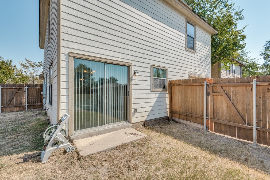 5701 Viewpoint Drive Austin, TX 78744 - Photo 23 of 25 a backyard of a house