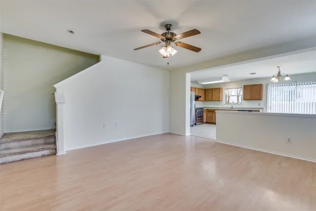 a view of a kitchen with a sink and cabinet