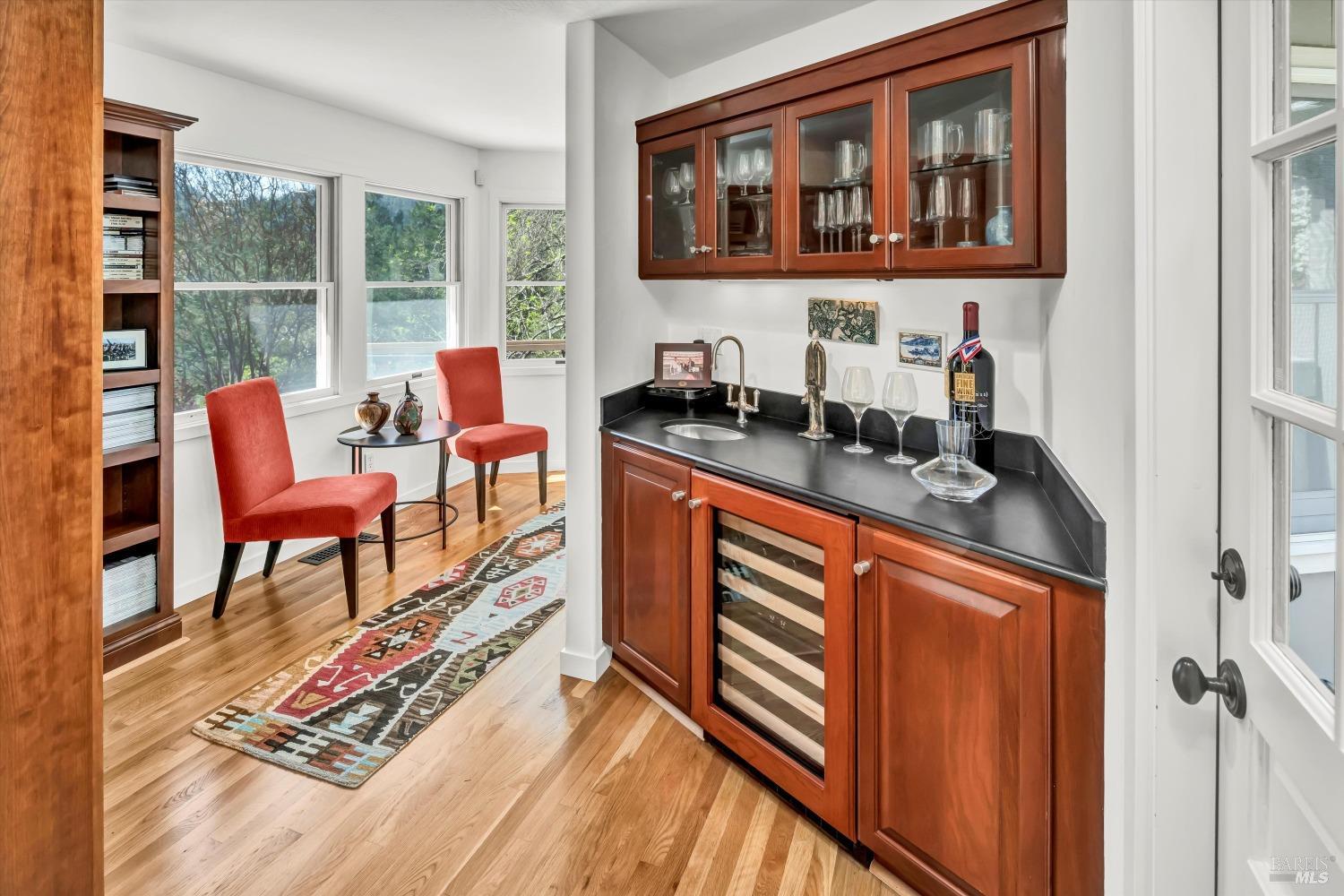 511 Kortum Canyon Road Calistoga, CA 94515 - Photo 22 of 87 Wet bar and bookshelves which lead towards the Primary bedroom wing.