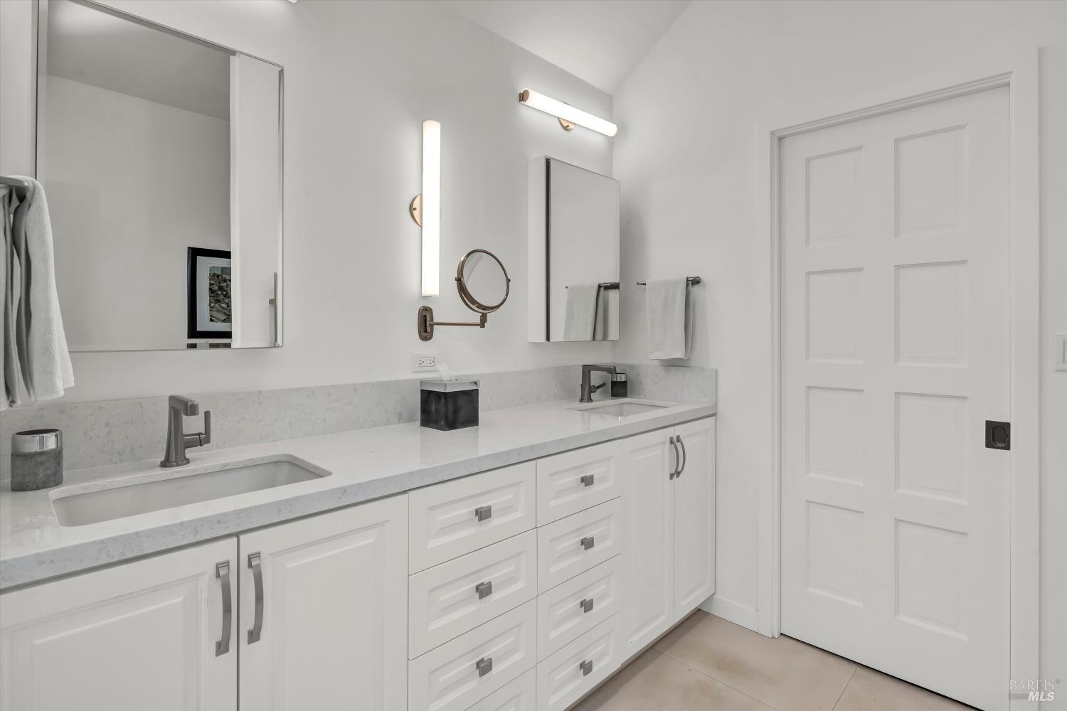 511 Kortum Canyon Road Calistoga, CA 94515 - Photo 25 of 87 Primary bathroom with double sinks and cedar lined walk in closet.