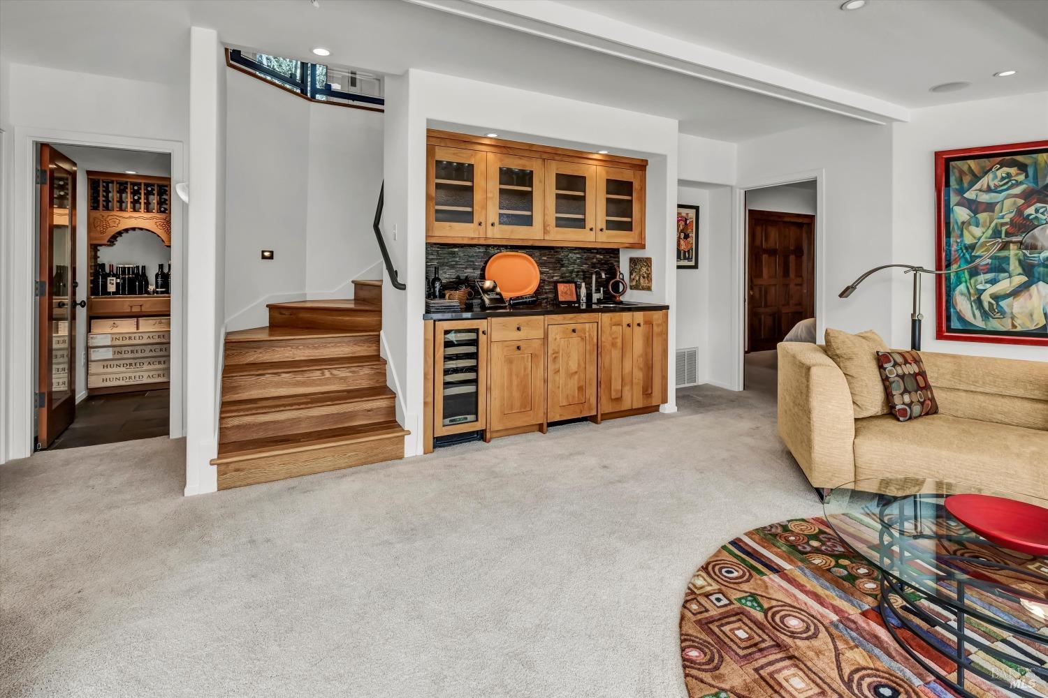 511 Kortum Canyon Road Calistoga, CA 94515 - Photo 30 of 87 Family room with wet bar and entrance to wine cellar.