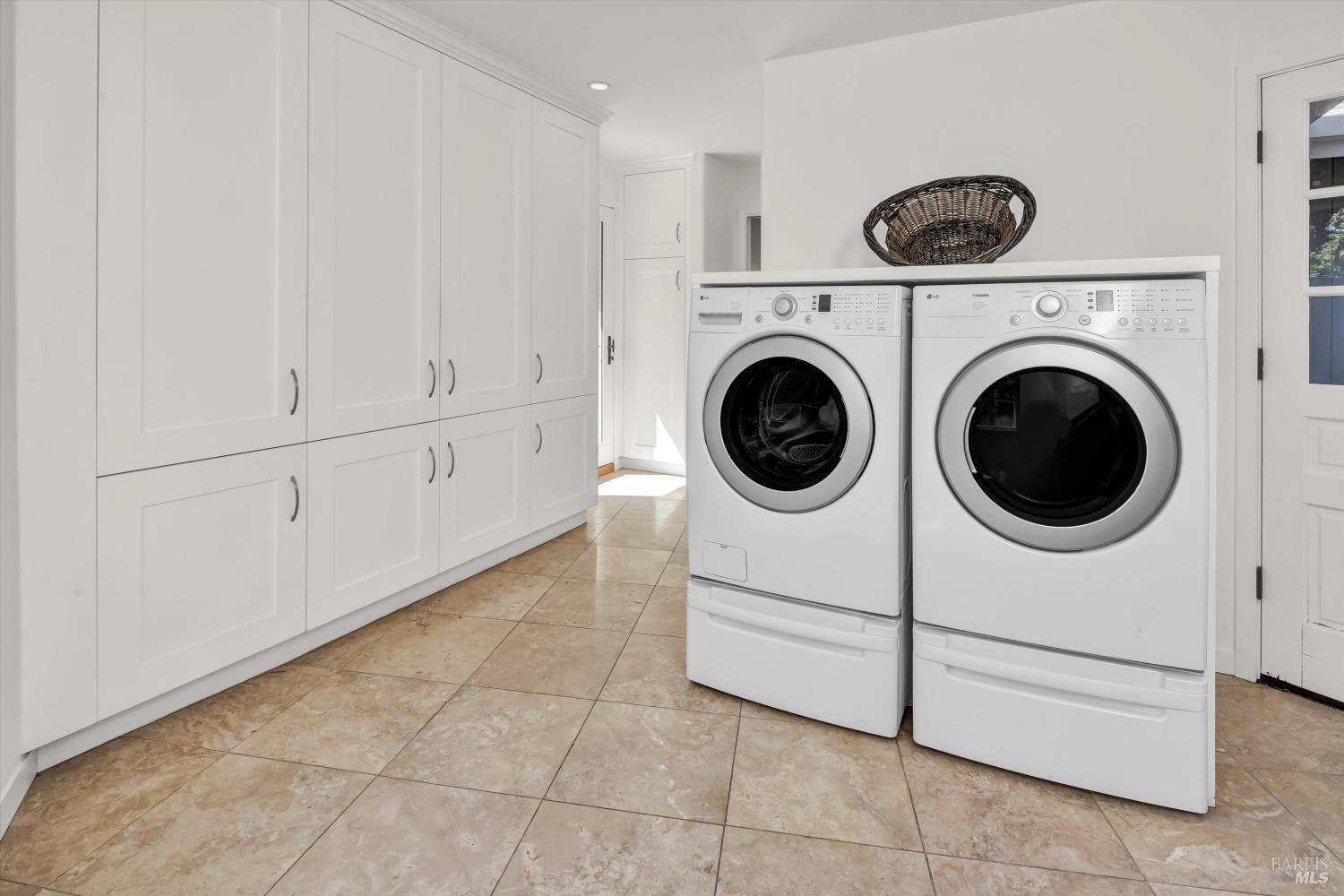 511 Kortum Canyon Road Calistoga, CA 94515 - Photo 42 of 87 Laundry room with lots of cabinets has interior garage access and is off of the kitchen.
