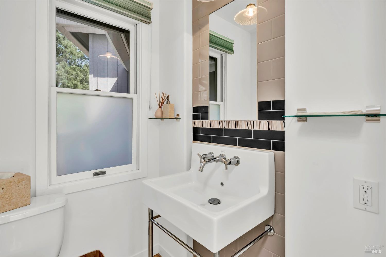 511 Kortum Canyon Road Calistoga, CA 94515 - Photo 43 of 87 Powder room in the laundry room off the kitchen.